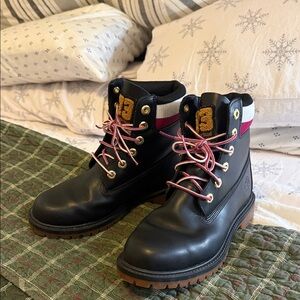 Timberland women's 6"heritage Black Boots with Pink Accents.  Almost perfect.